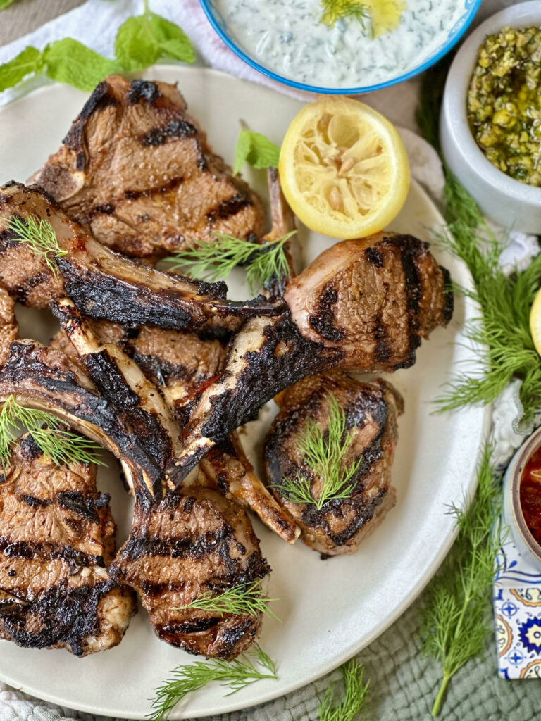 Harissa Lamb Chops with Herby Pistachio Sauce and Tzatziki